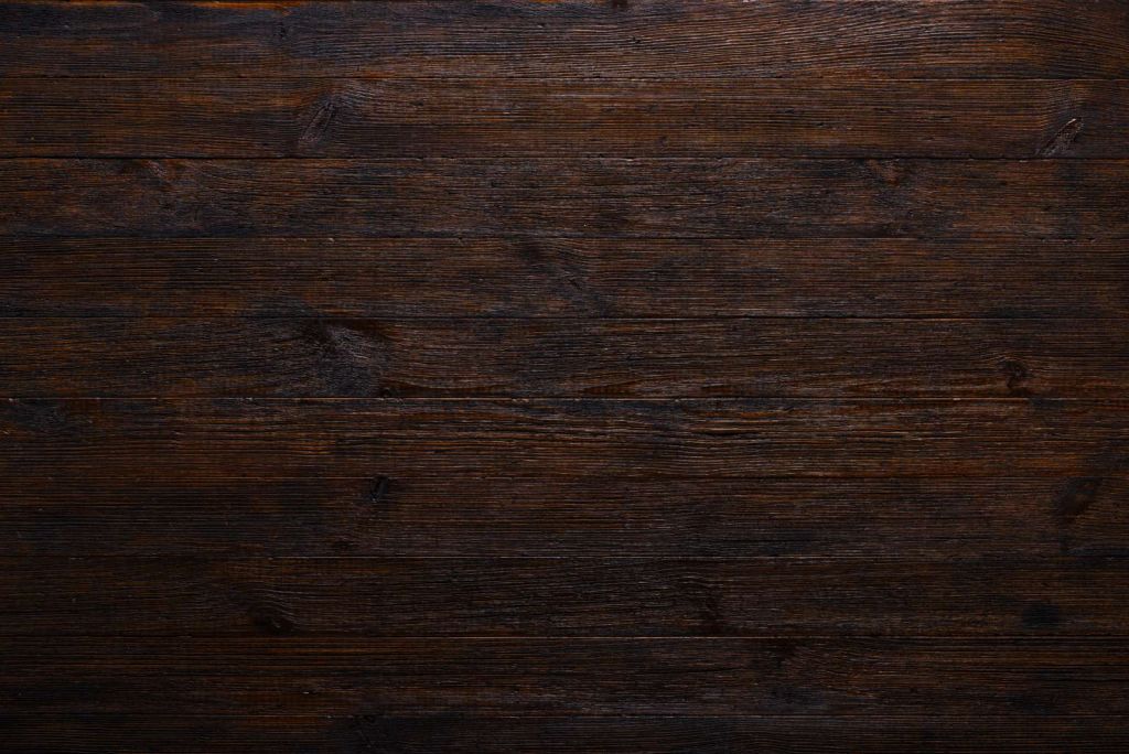 Donkere houten planken