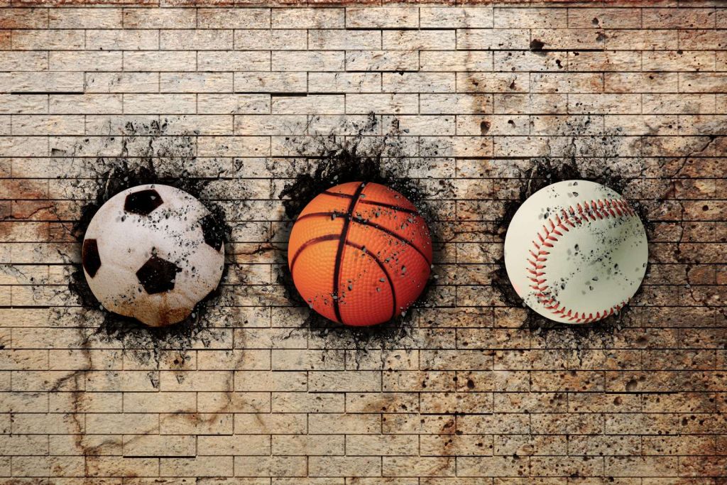 Sportballen in een muur